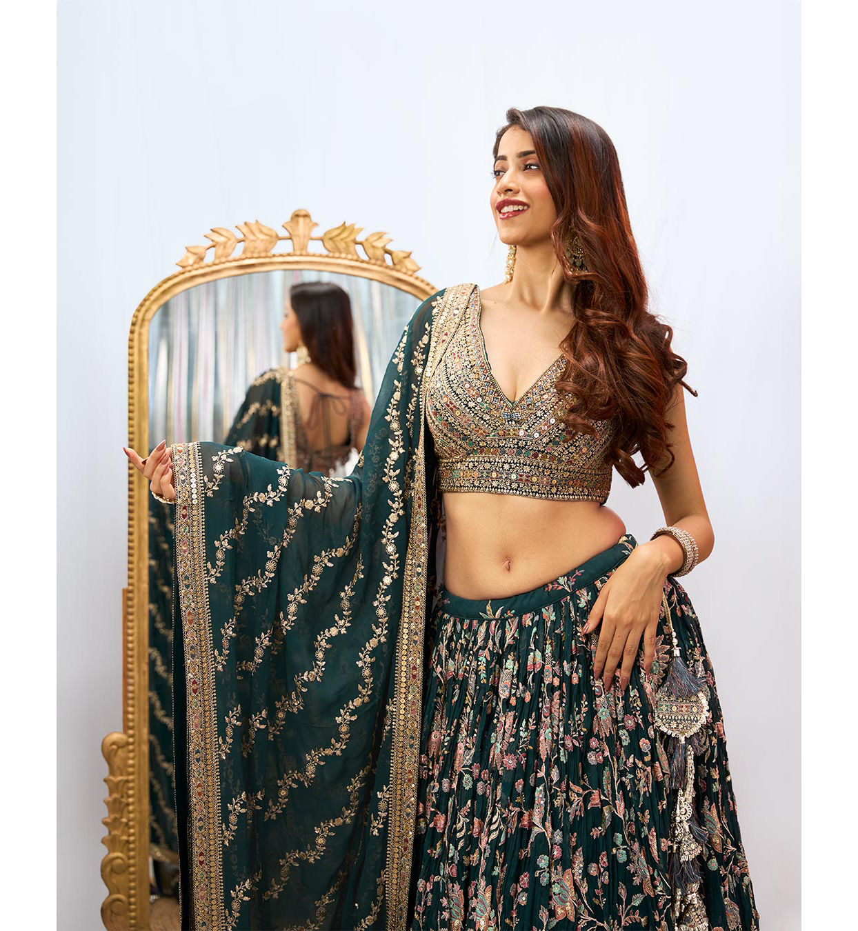 alt message - Mohey Women Stunning Teal Green Georgette Crop Top Lehenga with Jaal Border image number 1